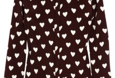 What she wore: Victoria Beckham in Burberry Prorsum’s Heart-print silk-crepe shirt