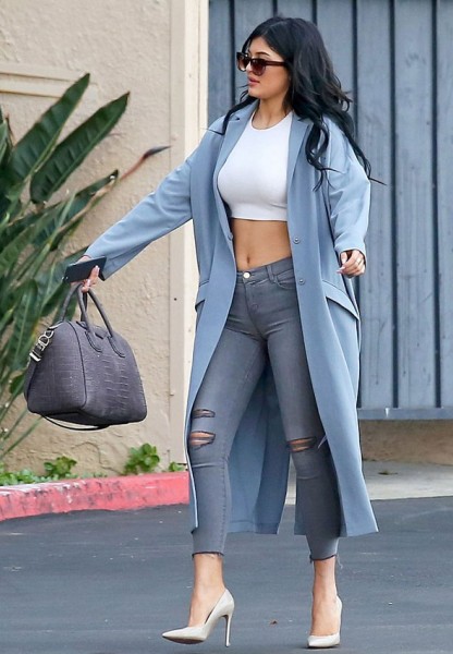 Kylie Jenner in a light blue duster coat