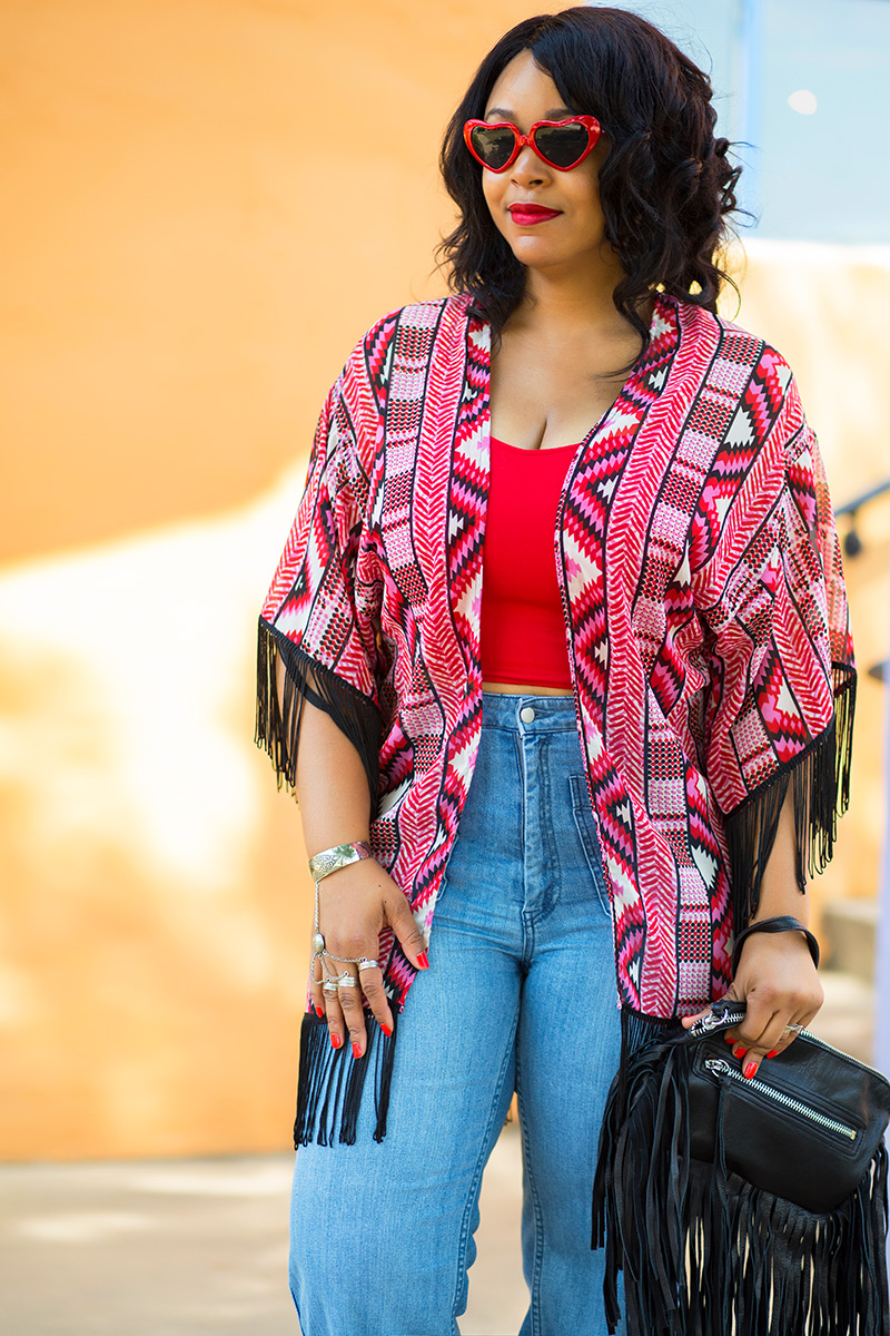 12 Ways to Wear Denim and get the look: Wide-Leg Jeans, 70's style, 70's inspired fashion, Heart-shaped sunglasses, Fringe Kimono, Crop top, H&M High waist Wide-leg Jeans, Corso Como Nani Wedges, Linea Pelle Janis Fringe Leather Clutch, My style
