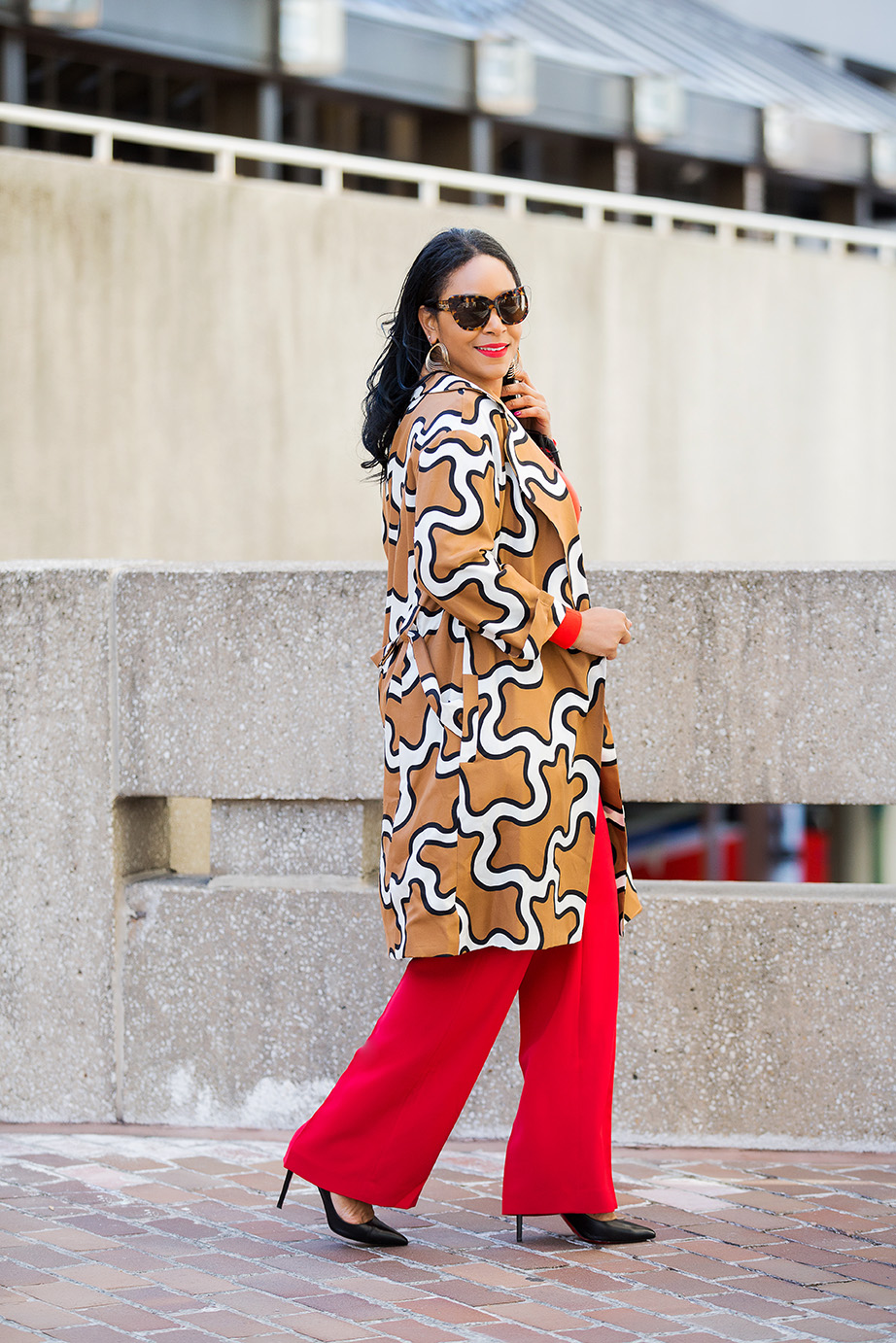 Four Ways to Tackle Mondays Like a Boss / What I'm Wearing: DvF Squiggle Print Trench coat, orange H&M Bodysuit, red H&M Suit Pants, Christian Louboutin Pigalle Pumps