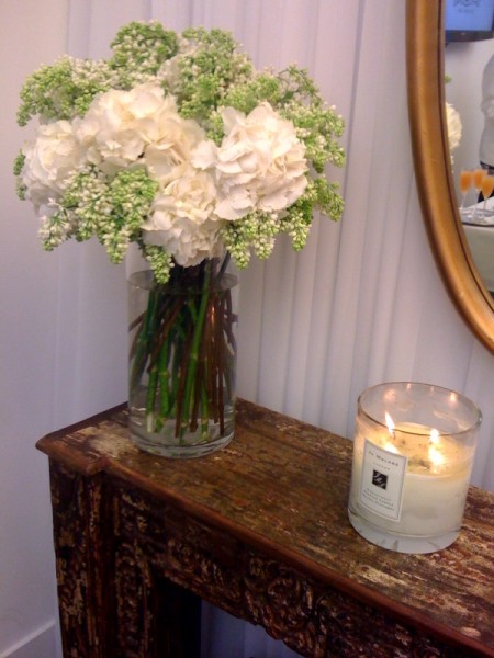 Rachel Roy showroom flowers candle