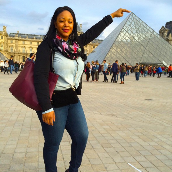 Wearing a chambray shirt and jeans at the Louvre  in Paris