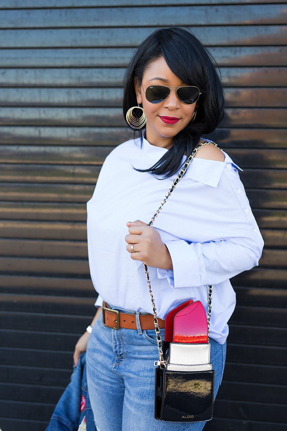 Finding fun this February - What I'm Wearing: charming Charlie Waved Layer Dangle Earrings, Zara Blouse with Asymmetric Neckline, Who What Wear collection Raw Edge Denim Jacket, Mossimo High-rise Skinny Jeans, Topshop Gold Mules Aldo Portland Lipstick bag