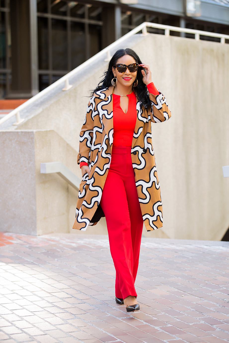 Four Ways to Tackle Mondays Like a Boss / What I'm Wearing: DvF Squiggle Print Trench coat, orange H&M Bodysuit, red H&M Suit Pants, Christian Louboutin Pigalle Pumps