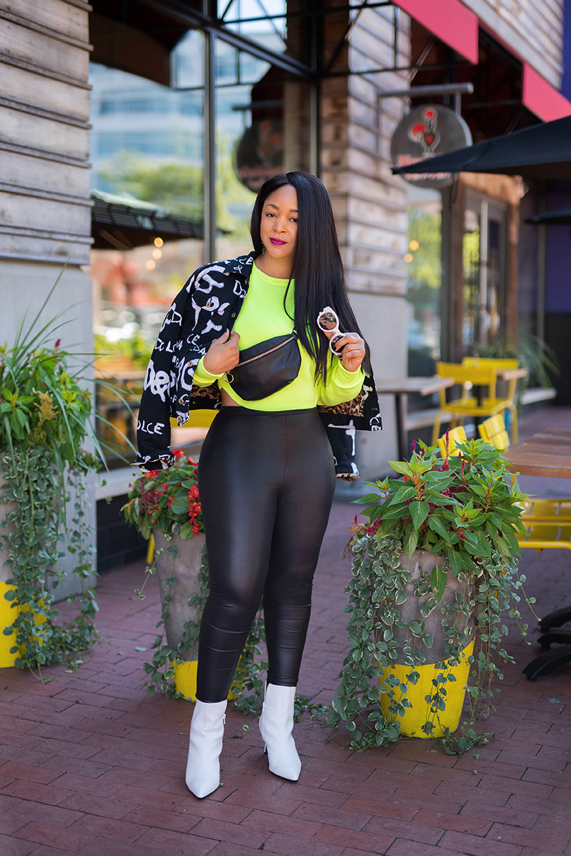 Three Ways to Wear Faux Leather Leggings, What I'm Wearing: Neon Cropped Sweatshirt, Faux Leather Leggings, Dolce & Gabbana Grafitti Jacket, White Boots, Black Fanny Pack/Belt Bag