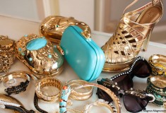 Anna Dello Russo’s ‘over-the-top accessories collection’ for H&M includes gilded gold & turquoise clutches, strappy sandals and animal bangles