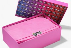 Special Jimmy Choo packaging which includes pink dust bags and bright pink boxes with dégradé lining, sealed with an angel or devil panda sticker
