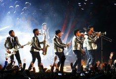 Bruno Mars and band perform during the Pepsi Super Bowl XLVIII Halftime Show, Saint Laurent Metallic One-Button Blazer