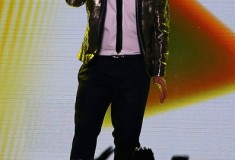Bruno Mars performs during the Pepsi Super Bowl XLVIII Halftime Show, Saint Laurent Metallic One-Button Blazer